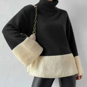 Stickad tröja  - Använd ett fåtal gånger. Väldigt skön stickad tröja med polokrage. 