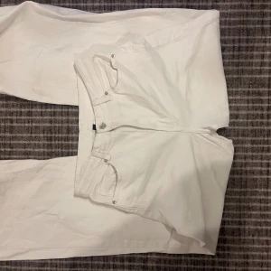 Vita jeans  -  Vita mellan låga jeans 