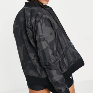 Reversible bomber jacket  - Move reversible bomber jacket Brand : Under Armour Size : s/m Black/camouflage Used but looks like new