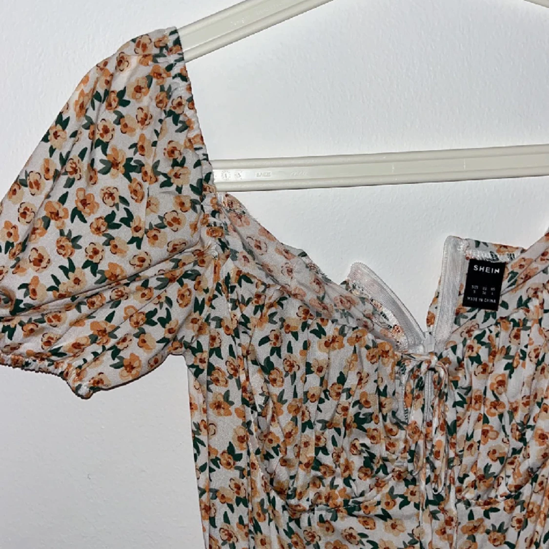 Blommig klänning - 91