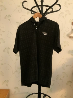 Callaway piké - Svart Callaway tröja i mjukt material och sparsamt använd. Storlek L men passar även M.