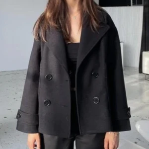 design by si kappa - svart kappa nyskick 