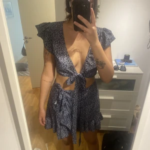 Somrigt set - Man kan ha tröjan åt båda hållen. Aldrig använt 