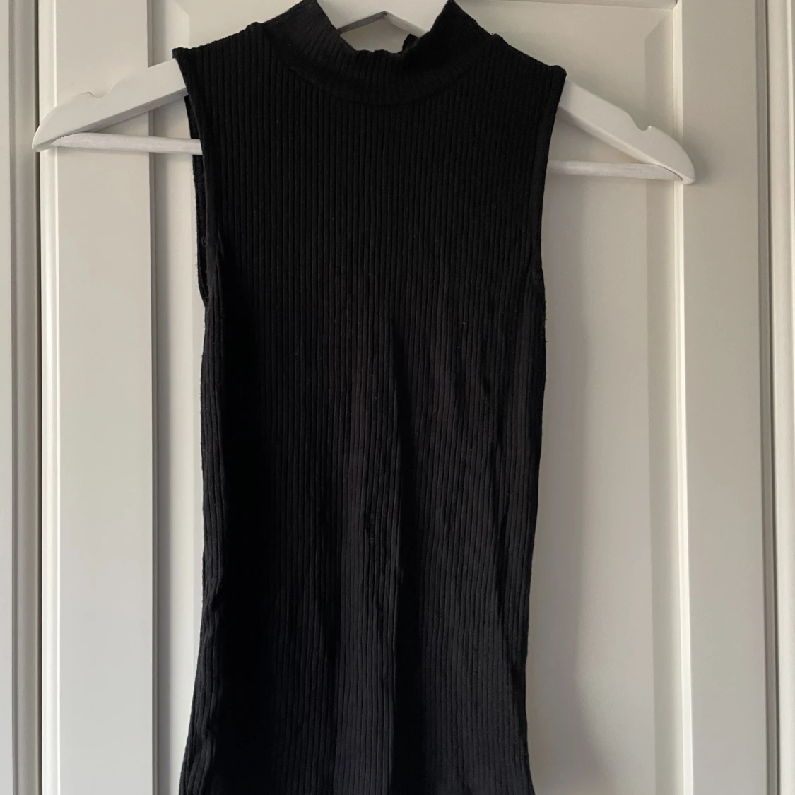 Linne med hög hals, New Yorker