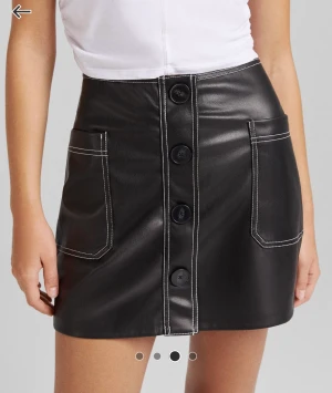 Miniskirt fake leather with pocket and white stitches  - Really good condition