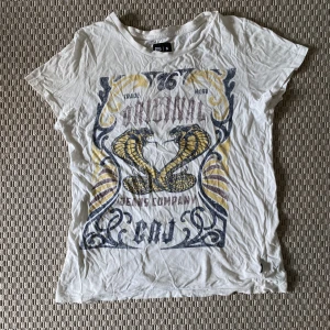 Vintage T-shirt  - Vintage T-shirt med tryck i storlek S 