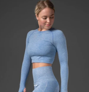 Relode crop top - Långärmad och croppad träningströja, storlek XS. Stretchigt och skönt material. 