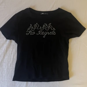 Svart topp - Endast använd fåtal gånger.