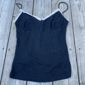 Ribbed lace shirt - A ribbed shirt with lace on it, used around 4 times 