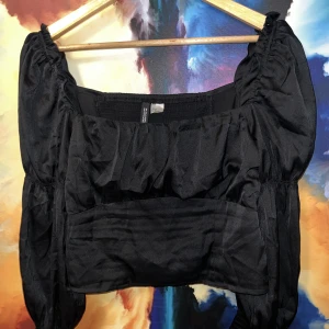 Long sleeve-Corset top  - Size 42  Stretchy  It’s from DIVIDED