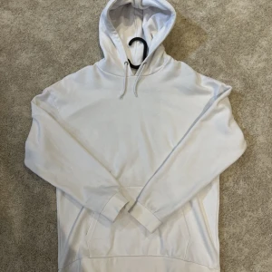 Vit Hoodie - Simpel vit Hoodie i mjukt material. 