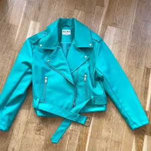Almost new ( worn once) green pu biker jacket