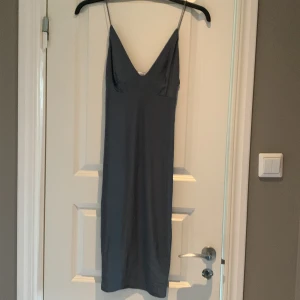 Klänning - Sparsamt använd