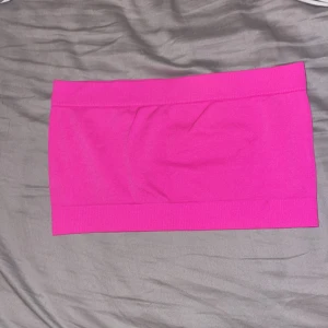 Neonrosa topp - Neonrosa topp. Använd fåtal gånger.