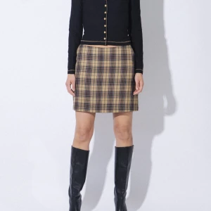 Mini skirt / Rutig minikjol - Rutig minikjol med fickor, fint skick! Storlek medium. Säljs även på IG @museushop. Följ oss där för mer 90tals klassiker