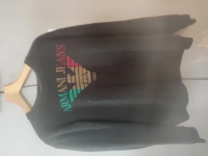Sweathshirt Emporio Armani - Sweatshirt av märket Emporio Armani i reaggaefärger. Storlek L. Jättefint skick