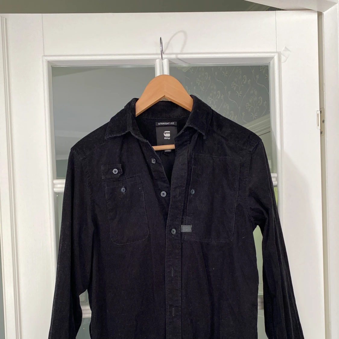 Svart manchesterskjorta