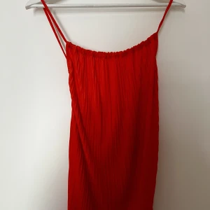 Somrigt linne🧡 - Oanvänt orange linne🧡