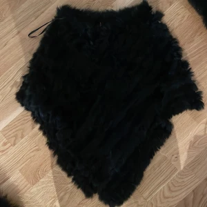 Pälsponcho - Pälsponcho knappt använd 