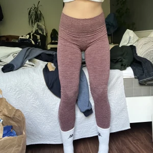 Rosa träningstajts  - Fint skick 