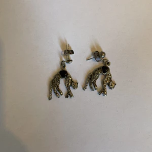 80-tals öronhengen - Aldrig använd