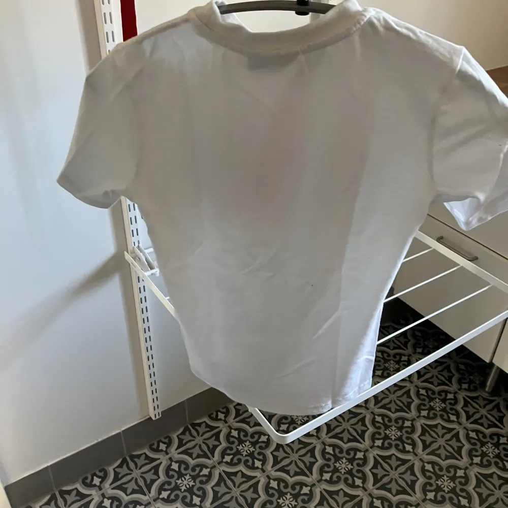 Helt oanvänd Juice Couture t-shirt, XS. Pris vid inköp 599 kr.. T-shirts.