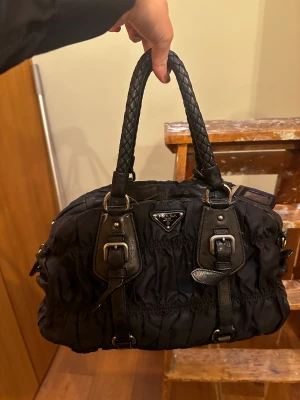 Real Prada bag  - Hi!  I’m selling my beloved Prada bag. I bought it on Vestiaire Collective, which is a website that has experts that verifies that it is REAL🩷