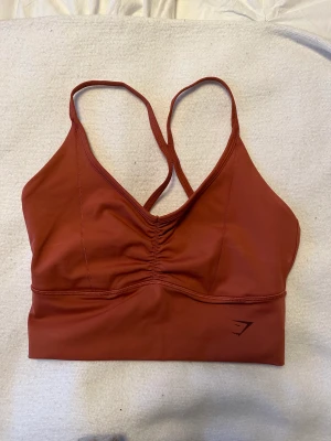 Träningslinne - Träningslinne gymshark i rostig färg storlek S