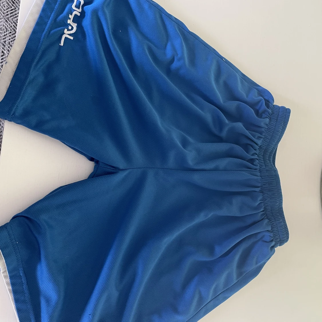 Blåa träningshorts