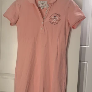 Bondelid Klänning  - En rosa Bondelid Klänning, använd några gånger, i bra skick, Inga fläckar.