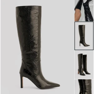 NA-KD svarta boots med klack - Snygga festklackar som man även kan ha till vardags. Använt ett fåtal gånger men tycker att jag blir för lång med dessa klackar. Storlek 40 och normala i storleken. Nypris är ca 900 kr