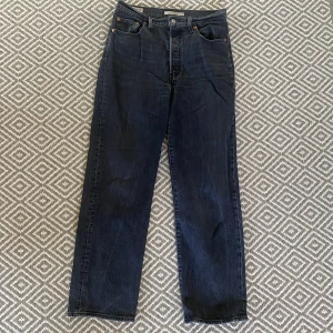 Levis jeans  - Jeans från Levis i storlek W29 L29. Är i modellen Ribcage straight. Fint skick.
