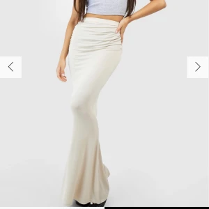 Långkjol - Super bekväm och fin Långkjol i beige. Enbart testad men är super fin på och smickrande