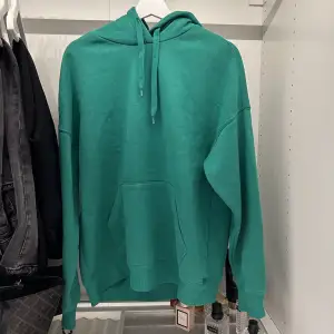 Grön hoodie i strl S från new yorker