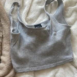 Topp - Jättefin grå topp i storlek S