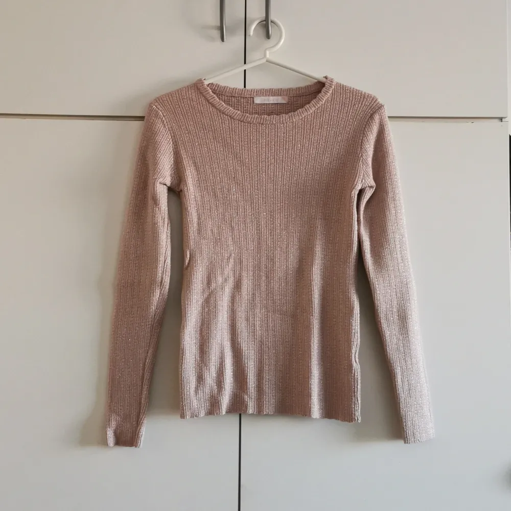 Sweater from Love and M. Size S. Very few times used . Stickat.