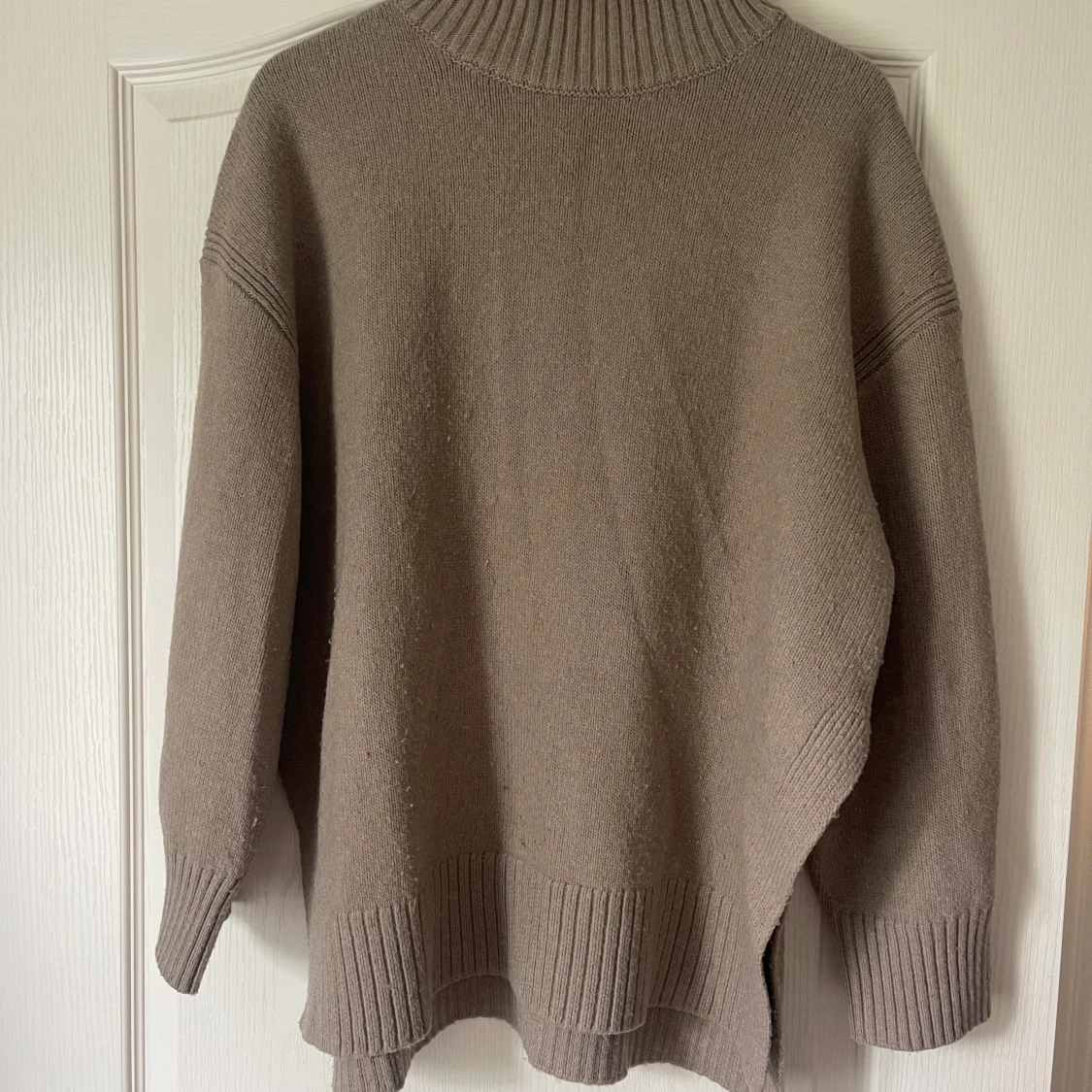 Beige stickad tröja