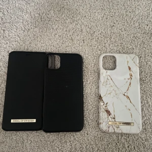 iPhone 11 skal  ideal of Sweden  - Två Ideal of sweden skal för iPhone 11  Endast använda 1-2 gånger då ja bytte telefon och dessa ej j kommer till någon användning. Priset är för två 