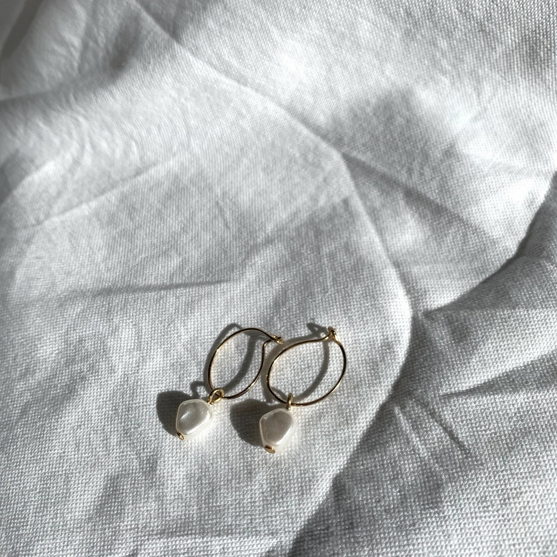 guld pärlörhängen