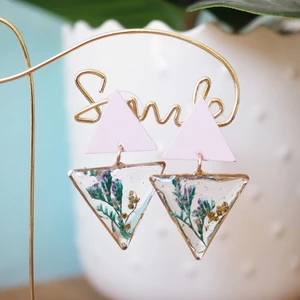 Blue flower earrings - I collected this super cute flower during spring - summer 2021 in Sweden. I carefully pressed on wooden flower press for a week. I colored a dried flower and embed with uv-resin.