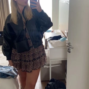 Klänning  - Mönstrad snygg klänning! 