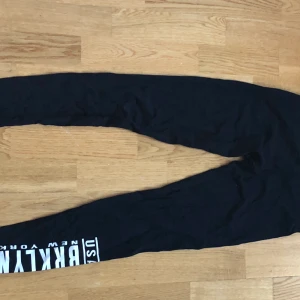 Svarta byxor för barn - Tajts, bekväma, för barn 