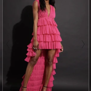 Nakd tyllklänning  - En oandvända klänning och slutsåld i denna storlek 