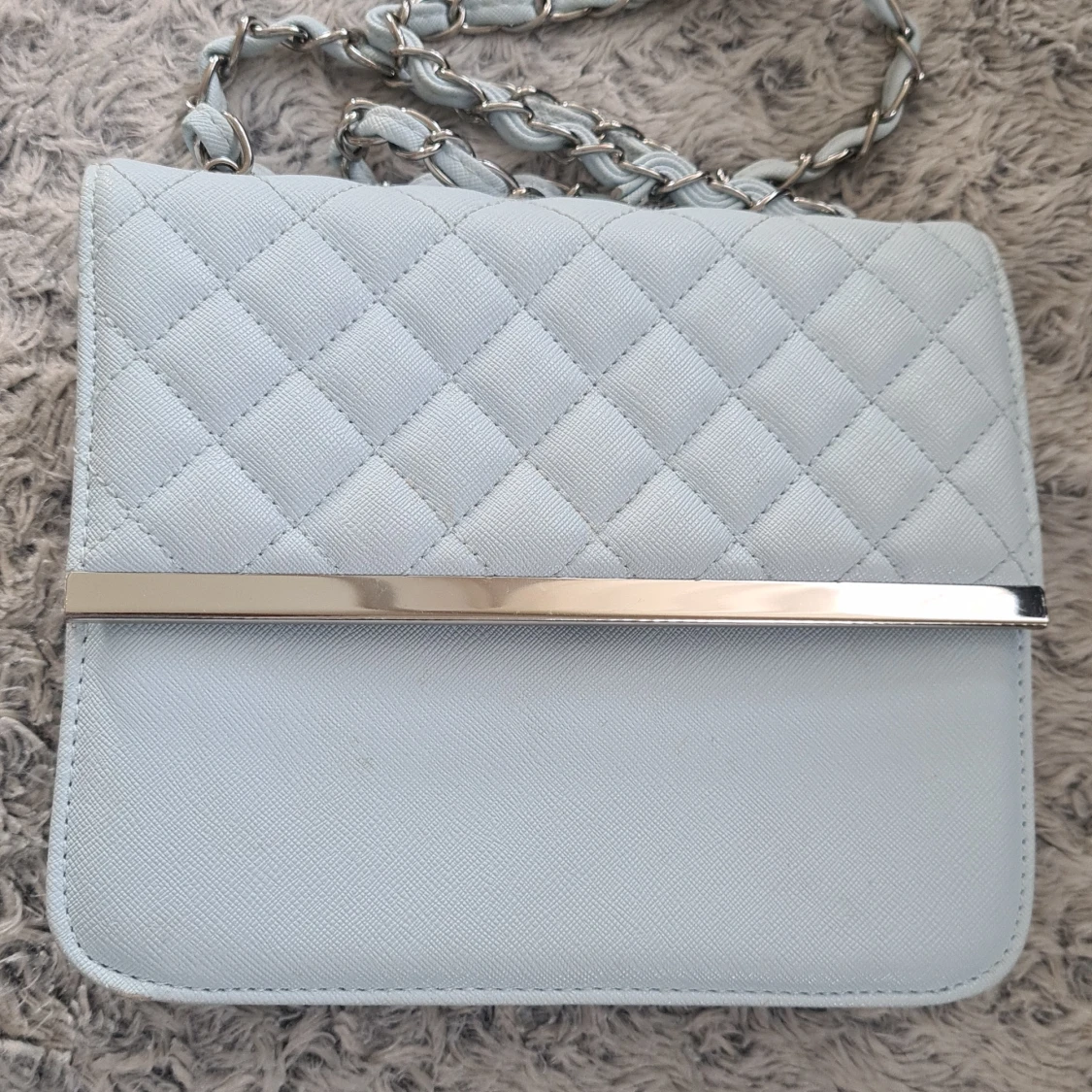 Fin ljusblå väska - 91