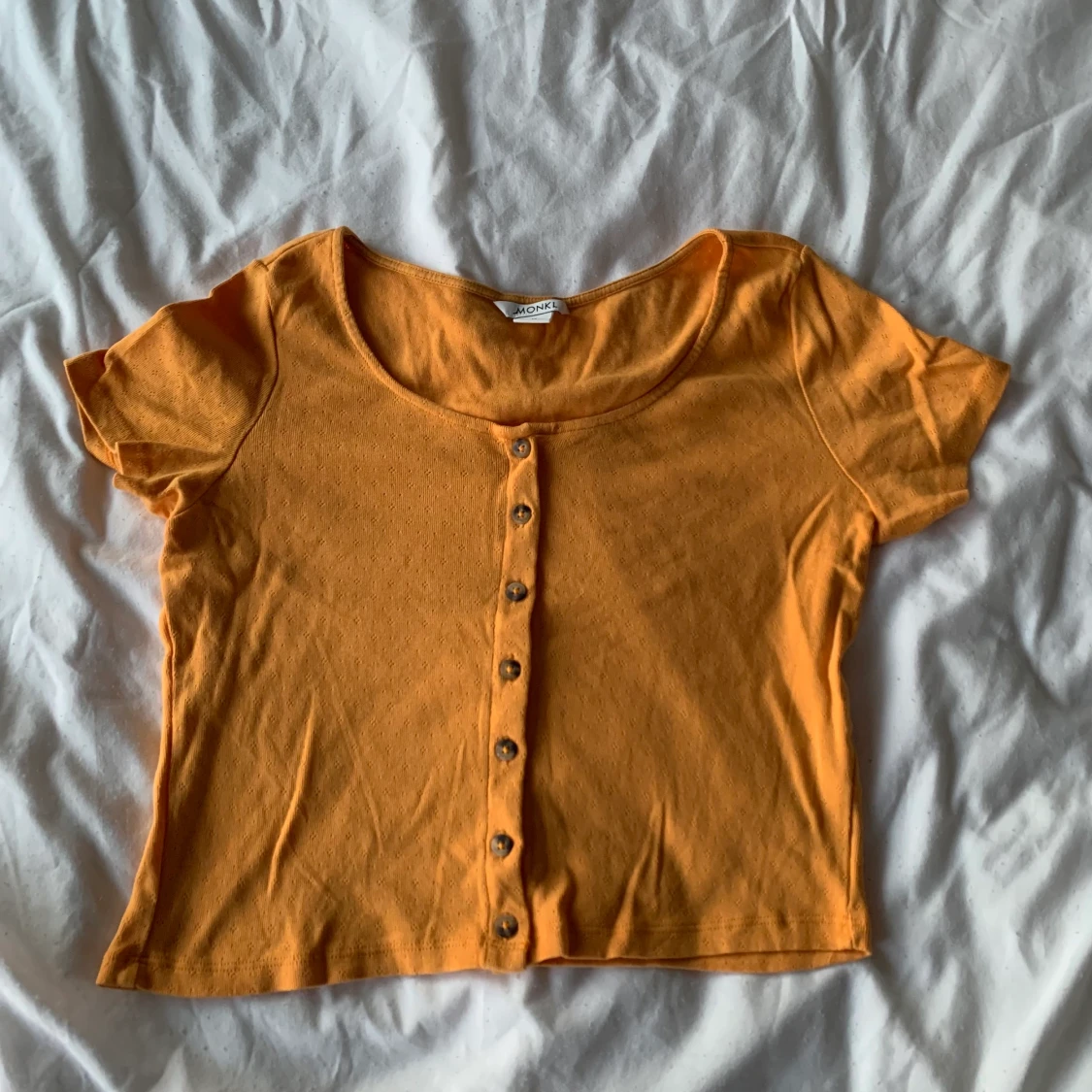 orange/mustard monki top in size M