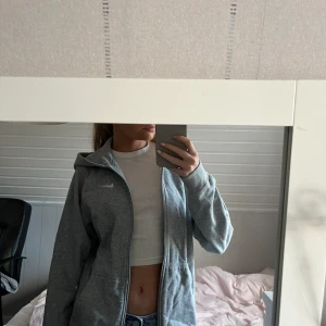 Nike zip Hoodie  - Nike zip hoodie i grått 