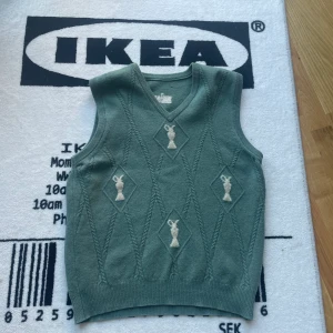Grön väst - Grön stickad väst. Bra skick storlek M
