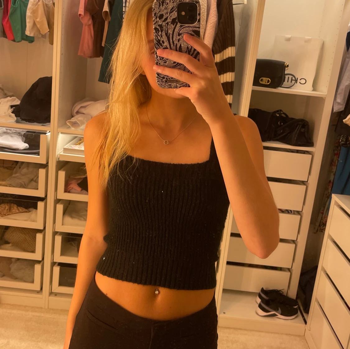 Glittrig stickad topp