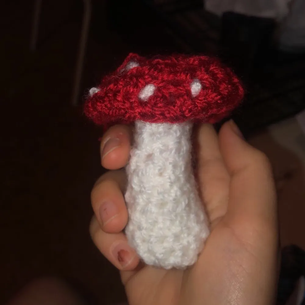 Cute mushroom crocheted it’s as big as a hand . Accessoarer.