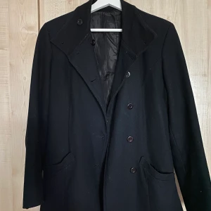 Höstkappa - Bra skick, med lite hål i fickorna 